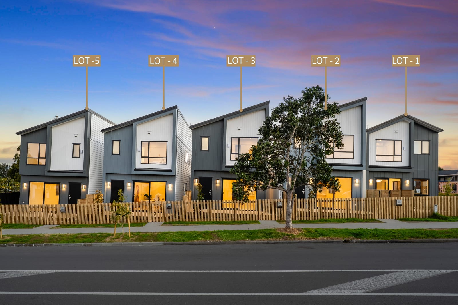 The street elevation at dusk with each home labelled, Lot 5 on the left through to Lot 1 on the right